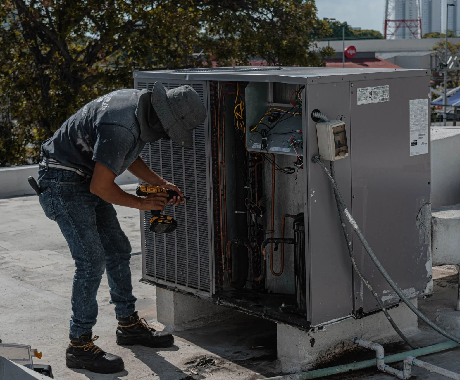 Close-up of a refrigerant line during an AC inspection